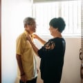 What is the politically correct term for caregiver?